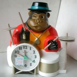 Photo of NOS Vintage Rhythm Speak Up Alarm Clock/ONE MAN BAND/GORILLA front view