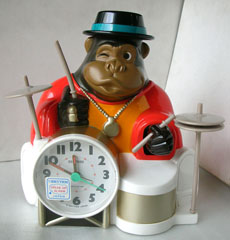 Photo of NOS Vintage Rhythm Speak Up Alarm Clock/ONE MAN BAND/GORILLA front view sm