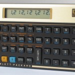 photo of vintage hewlett packard hp 12c financial calculator side view