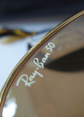 photo of NOS Ray-Ban 50th anniversary sunglasses 62mm. logo view sm